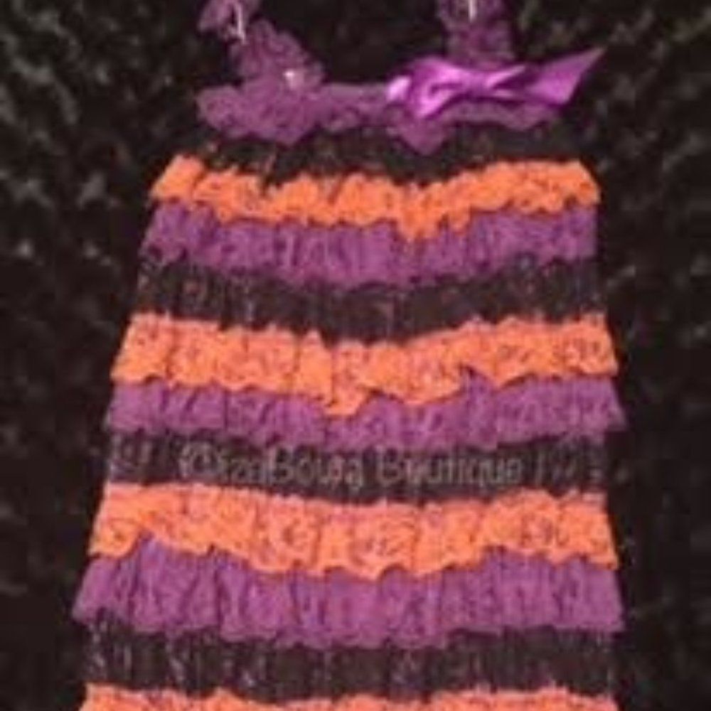 Purple, Orange & Black Romper  45R  2XL 6-7 years  new